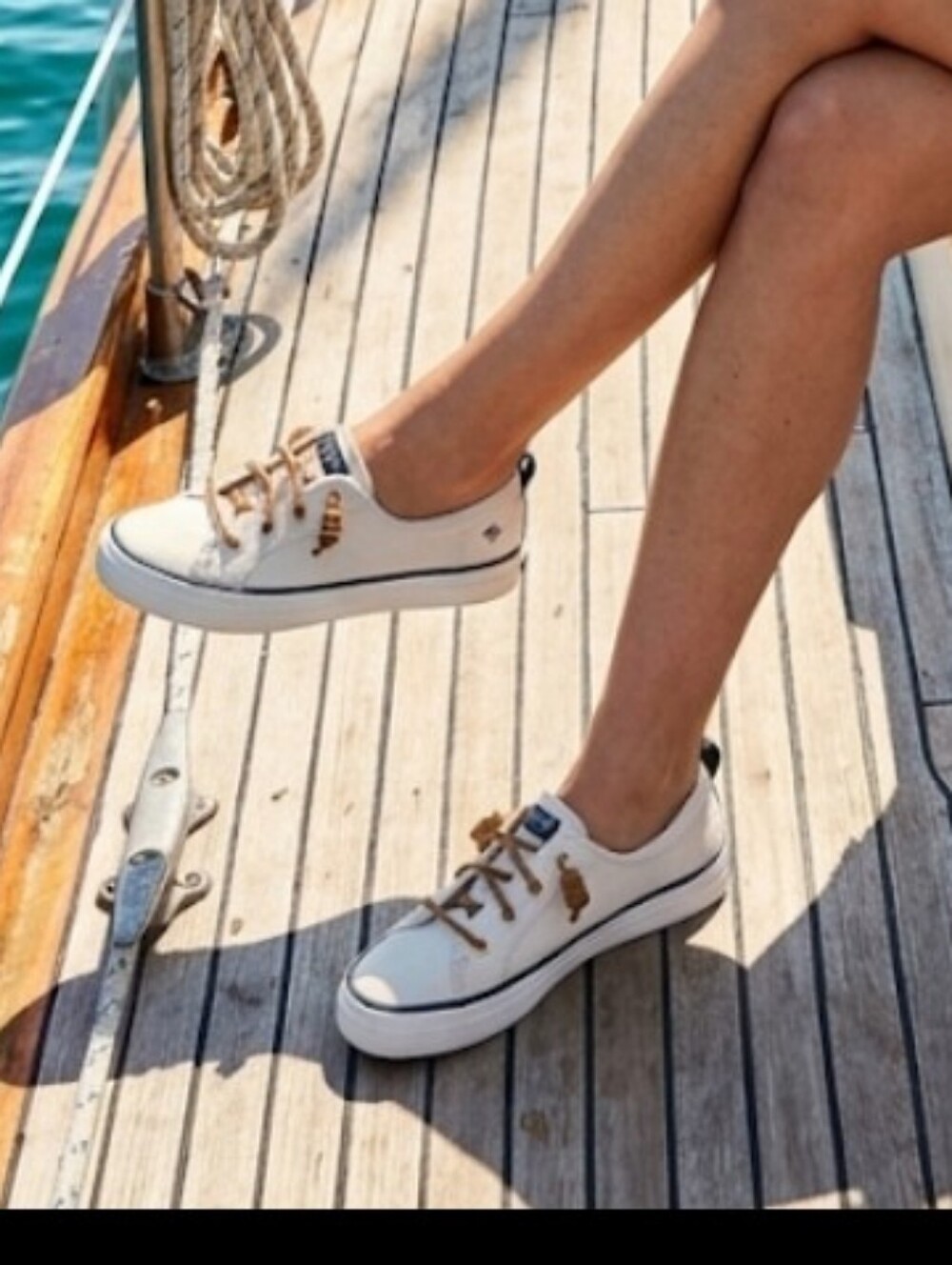 Sperry Top Sider Women's Cream Canvas Boat Shoes with Brown Laces.
